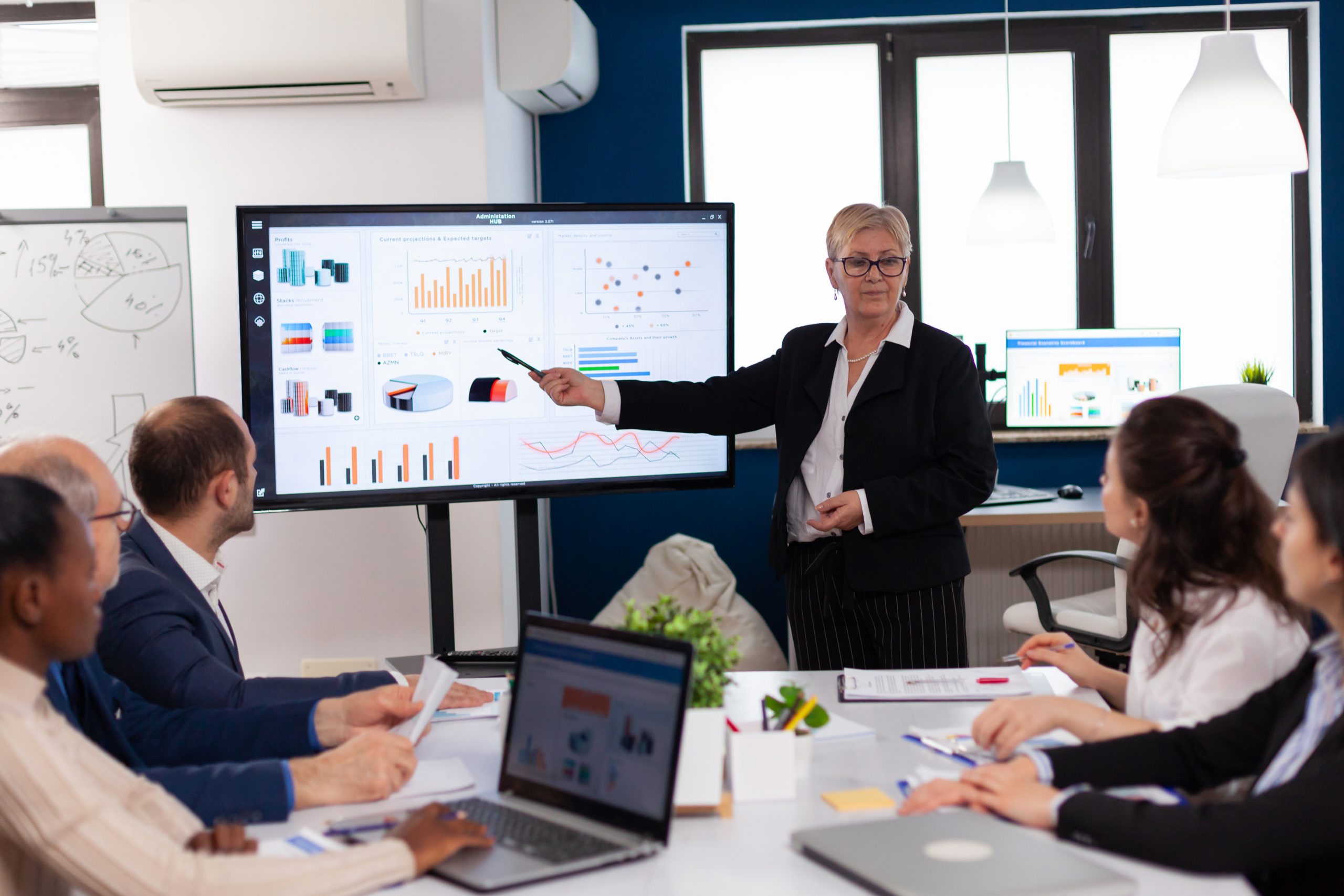 Senior startup businesswoman holding presentatin in conference room Presentation